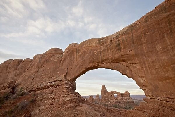 Turret Arch through North Window at dawn, Arches National Park, Utah, United States of America