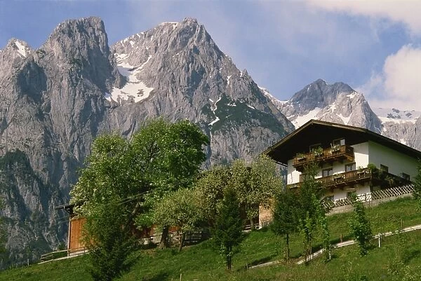 Typical chalet, with mountains behind, in the Werfern area of Austria, Europe