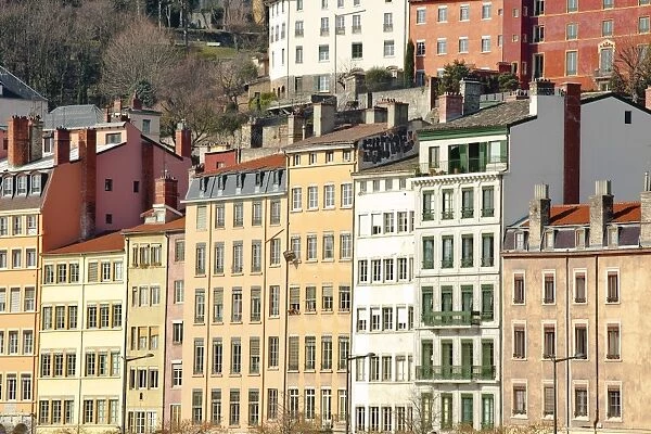 Typical colourful building facades facing onto the River Saone in Lyon, Rhone-Alpes, France, Europe