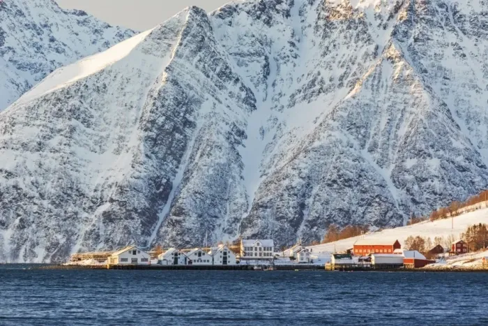 Framed Print : The typical fishing village of Hamnes framed by snowy peaks and the cold sea, Lyngen Alps Framed Print : The typical fishing village of Hamnes framed by snowy peaks and the cold sea, Lyngen Alps