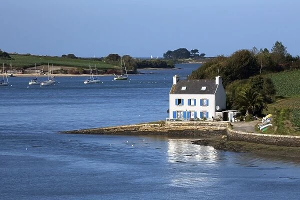Typical French cottage on Penze estuary viewed from Pont de la Corde, near Carantec
