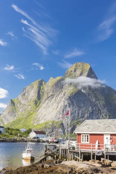 Framed Print : Typical house of fishermen called Rorbu framed by rocky peaks and blue sea, Reine Framed Print : Typical house of fishermen called Rorbu framed by rocky peaks and blue sea, Reine