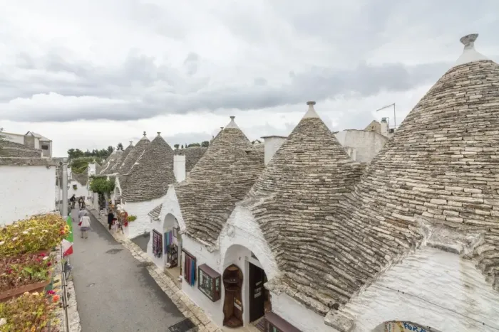 Framed Print : The typical huts called Trulli built with dry stone with a conical roof, Alberobello Framed Print : The typical huts called Trulli built with dry stone with a conical roof, Alberobello