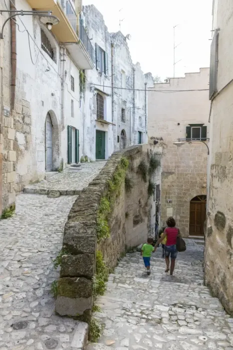 Framed Print : Typical stone alleys in the old town center of Matera also known as the Subterranean City Framed Print : Typical stone alleys in the old town center of Matera also known as the Subterranean City