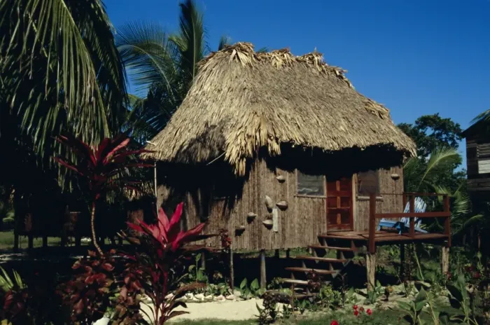 Framed Print : Typical thatched wooden hut on the island, Caye Caulker, Belize, Central America Framed Print : Typical thatched wooden hut on the island, Caye Caulker, Belize, Central America