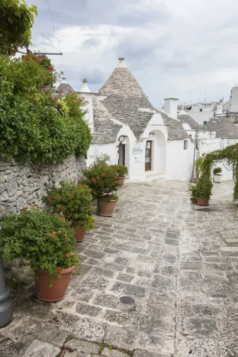 Framed Print : The typical Trulli built with dry stone with a conical roof, Alberobello, UNESCO Framed Print : The typical Trulli built with dry stone with a conical roof, Alberobello, UNESCO