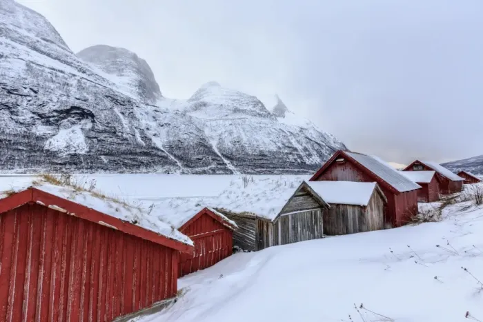 Framed Print : Typical wooden huts in the snowy landscape of Lyngseidet, Lyngen Alps, Tromso Lapland Framed Print : Typical wooden huts in the snowy landscape of Lyngseidet, Lyngen Alps, Tromso Lapland