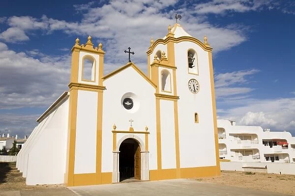 The typically Portuguese white facade of the Nossa Senhora da Luz chuch in Lagos, Algarve, Portugal