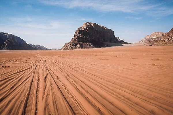 Tyre tracks in the sand in the Wadi Rum desert, UNESCO World Heritage Site, Jordan, Middle East