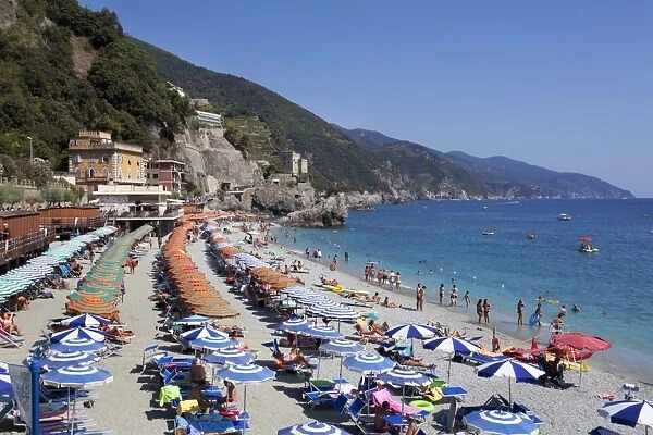 Umbrellas on the New Town Beach at Monterosso al Mare, Cinque Terre, UNESCO World Heritage Site, Liguria, Italy, Mediterranean, Europe