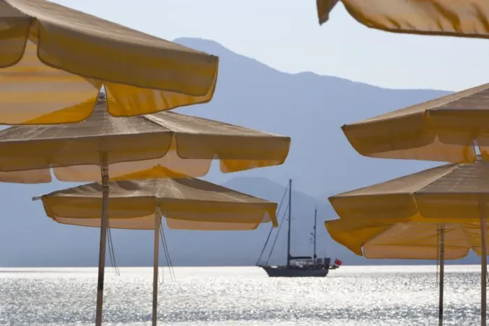 Framed Print : Umbrellas and yacht, Psili Ammos, Samos, Aegean Islands, Greece Framed Print : Umbrellas and yacht, Psili Ammos, Samos, Aegean Islands, Greece