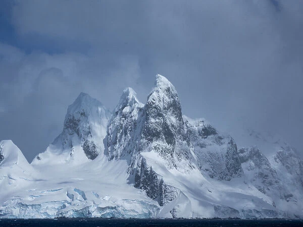 Una Peaks on false Cape Renard, the northern entrance to the Lemaire Channel, Antarctica, Polar Regions