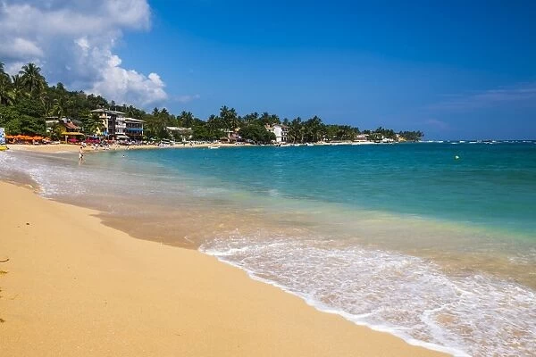 Unawatuna Beach, a beautiful sandy beach on the South Coast of Sri Lanka, Asia