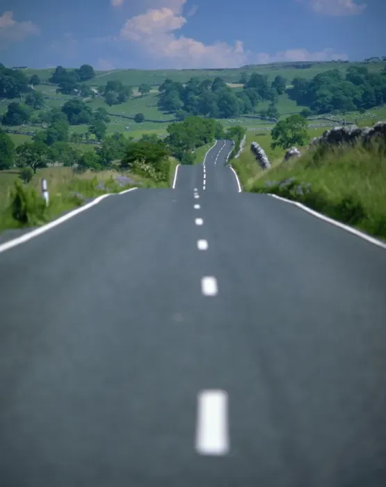 Framed Print : Undulating rural road through countryside, United Kingdom, Europe