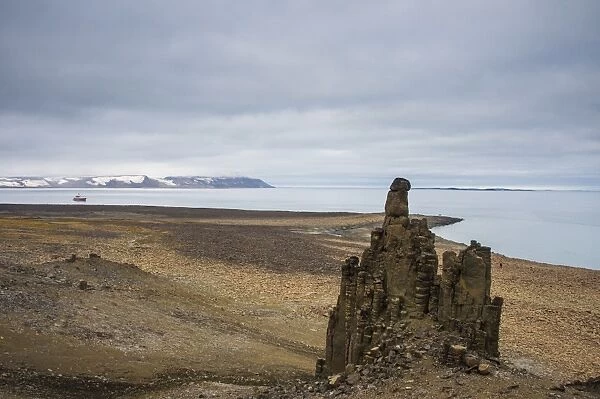 Unique sandstone formation in a barren landscape on Freemansundet, Svalbard, Arctic