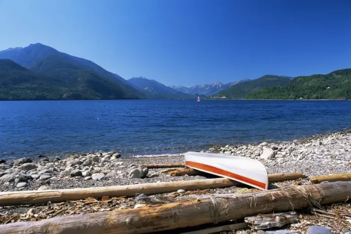 Framed Print : Upturned canoe on the rocky eastern shore of Slocan Lake, New Denver, British Columbia (B Framed Print : Upturned canoe on the rocky eastern shore of Slocan Lake, New Denver, British Columbia (B