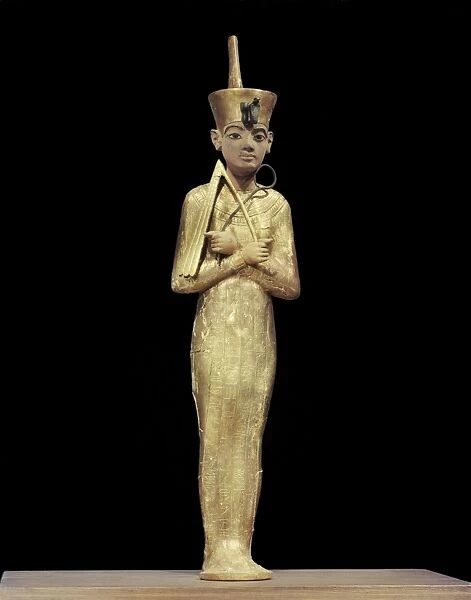 Ushabti of Tutankhamun, showning king wearing the red crown of the North