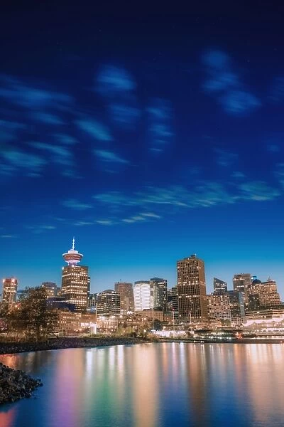 Vancouver skyline and high rise buildings at night, Vancouver, British Columbia, Canada