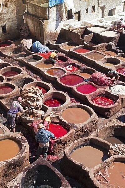 Vats for tanning and dyeing animal hides and skins, Chouwara traditional leather tannery in Old Fez, Fez, Morocco, North Africa, Africa