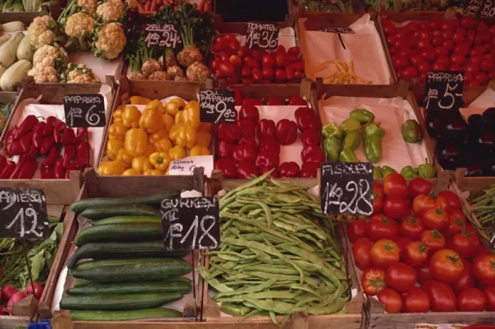 Framed Print : Vegetables including beans, cucumbers and peppers, in wooden boxes in the market in Vienna Framed Print : Vegetables including beans, cucumbers and peppers, in wooden boxes in the market in Vienna