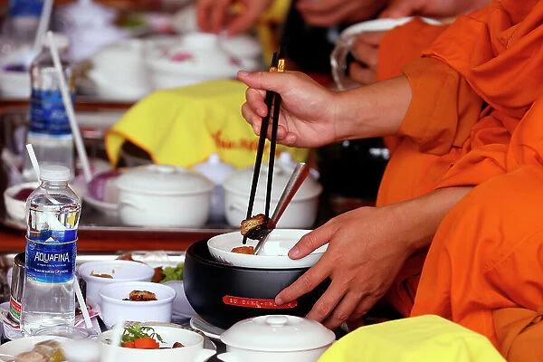 Vegetarian meal, monks at Buddhist ceremony in the main hall, Phuoc Hue Buddhist pagoda, Tan Chau, Vietnam, Indochina, Southeast Asia, Asia