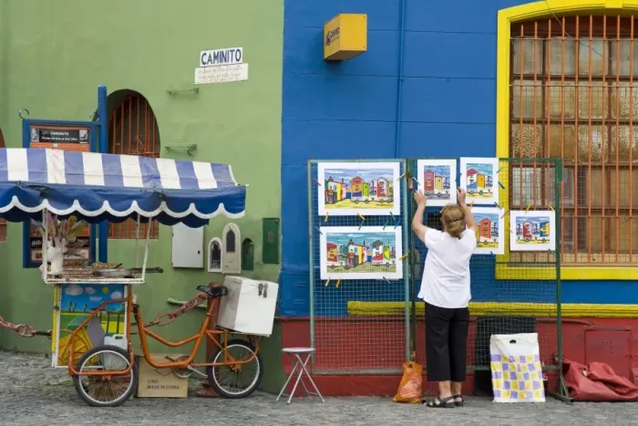 Framed Print : Vendor on El Caminito Street in La Boca District of Buenos Aires City, Argentina Framed Print : Vendor on El Caminito Street in La Boca District of Buenos Aires City, Argentina