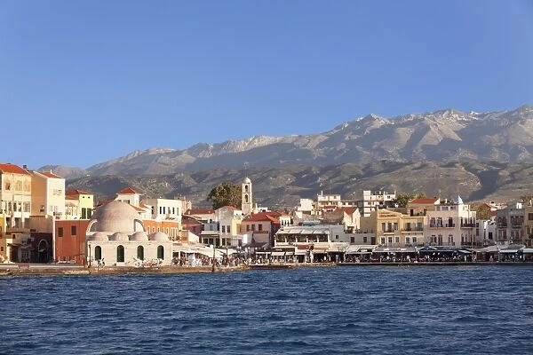Venetian port and Turkish Mosque Hassan Pascha in front of Lefka Ori Mountains (White Mountains), Chania, Crete, Greek Islands, Greece, Europe
