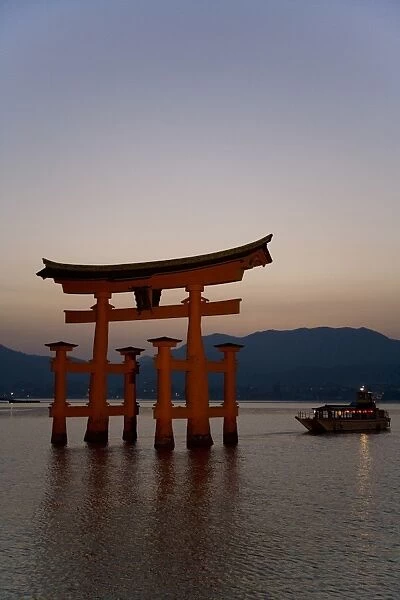 Vermillion coloured floating torii gate