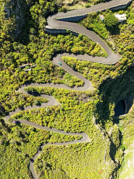 Framed Print : Vertical aerial view from the drone of a fantastic winding road on the island of Tenerife, Canary Islands, Spain, Atlantic, Europe Framed Print : Vertical aerial view from the drone of a fantastic winding road on the island of Tenerife, Canary Islands, Spain, Atlantic, Europe