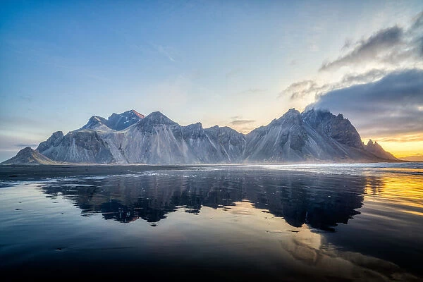 Vestrahorn Mountain with tidal reflections at sunrise, Southeast Iceland, Polar Regions