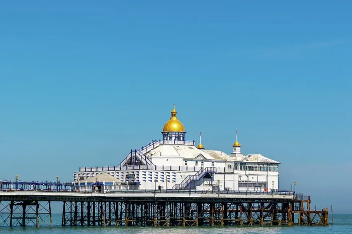 Framed Print : Victorian pier with a golden dome against a clear blue sky, symbolizing classic British seaside architecture, Eastbourne, East Sussex, England, United Kingdom, Europe Framed Print : Victorian pier with a golden dome against a clear blue sky, symbolizing classic British seaside architecture, Eastbourne, East Sussex, England, United Kingdom, Europe