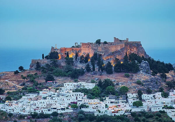 View towards the Acropolis of Lindos at dusk, Rhodes Island, Dodecanese, Greek Islands, Greece, Europe