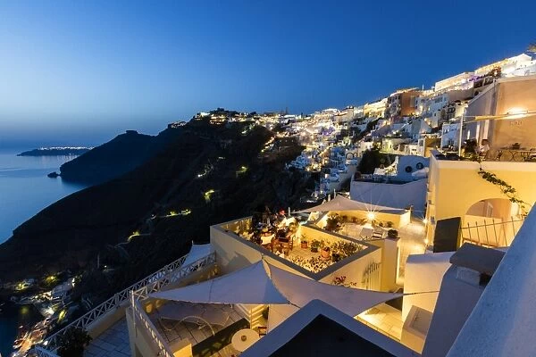 View of the Aegean Sea from the typical Greek village of Firostefani at dusk, Santorini