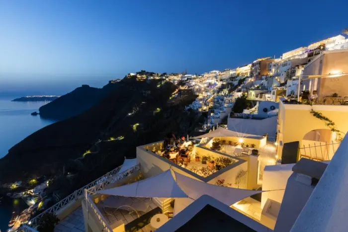 Framed Print : View of the Aegean Sea from the typical Greek village of Firostefani at dusk, Santorini Framed Print : View of the Aegean Sea from the typical Greek village of Firostefani at dusk, Santorini