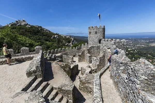 View of the ancient Castelo dos Mouros with its stone tower, Sintra municipality