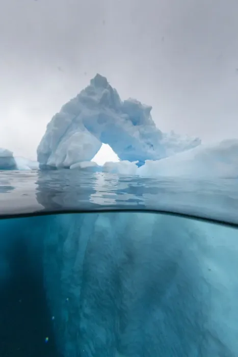 Framed Print : Above and below view of an arch formed in an iceberg at Cuverville Island, Ererra Channel Framed Print : Above and below view of an arch formed in an iceberg at Cuverville Island, Ererra Channel