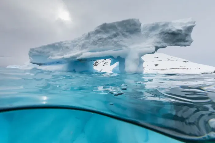 Framed Print : Above and below view of an arch formed in an iceberg at Cuverville Island, Ererra Channel Framed Print : Above and below view of an arch formed in an iceberg at Cuverville Island, Ererra Channel