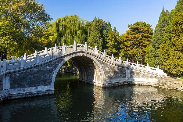View of arched bridge on Kunming Lake at Yihe Yuan, The Summer Palace, UNESCO World