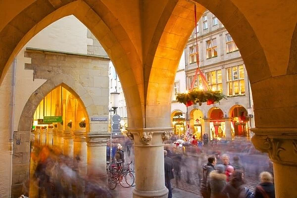 View through arches on Prinzipalmarkt, Munster, North Rhine-Westphalia, Germany, Europe