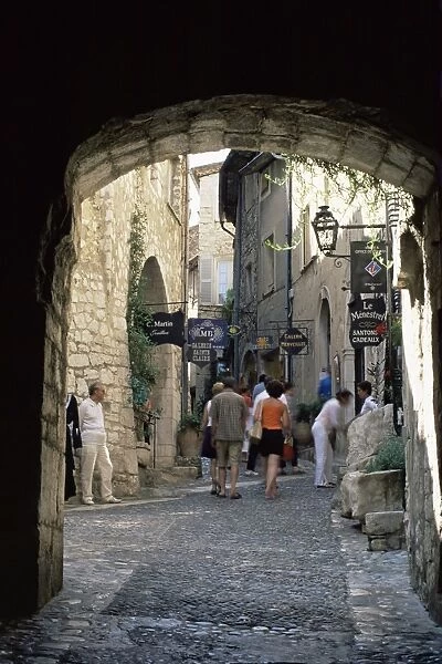 View through archway of narrow medieval alley, St. Paul de Vence, Alpes-Maritimes