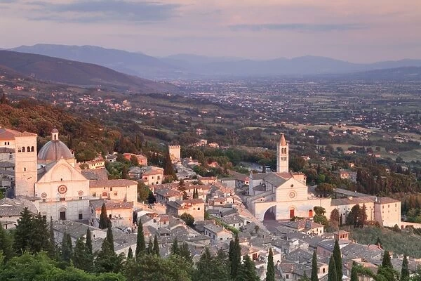 View over Assisi to Santa Chiara Basilica and San Rufino Cathedral at sunset, Assisi