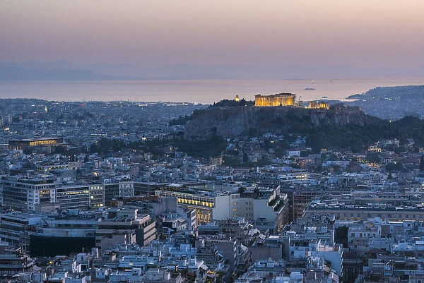 View over Athens and The Acropolis at sunset from Likavitos Hill, Athens, Attica Region