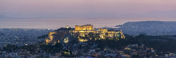 View over Athens and The Acropolis, UNESCO World Heritage Site, at sunset from Likavitos Hill
