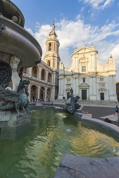 View of the Basilica of the Holy House and fountain decorated with statues, Loreto