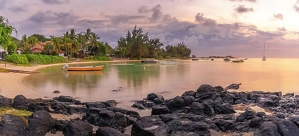 View of beach and Indian Ocean at sunset in Cap Malheureux, Mauritius, Indian Ocean, Africa