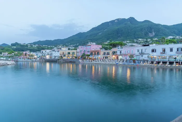 Framed Print : View of beach and the town of Lacco Ameno at dusk, Island of Ischia, Campania, Italy, Europe Framed Print : View of beach and the town of Lacco Ameno at dusk, Island of Ischia, Campania, Italy, Europe
