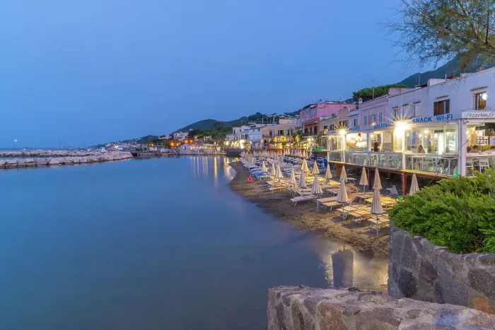 Framed Print : View of beach and the town of Lacco Ameno at dusk, Island of Ischia, Campania, Italy, Europe Framed Print : View of beach and the town of Lacco Ameno at dusk, Island of Ischia, Campania, Italy, Europe