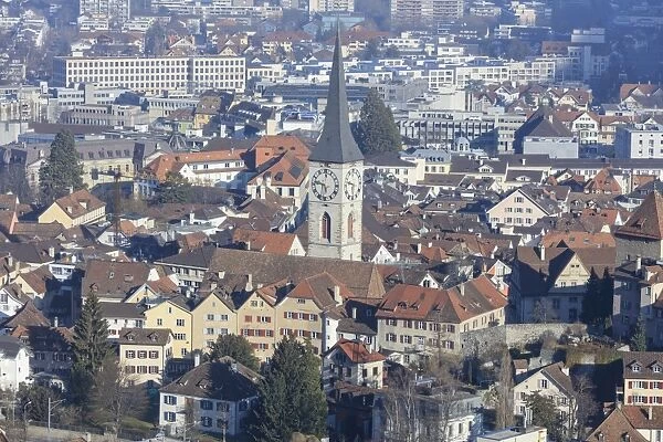 View of bell tower of Church of St. Martin and the city of Chur, district of Plessur