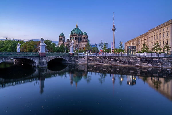 View of Berliner Dom, Berliner Fernsehturm reflecting in River Spree at dusk, Berlin, Germany, Europe