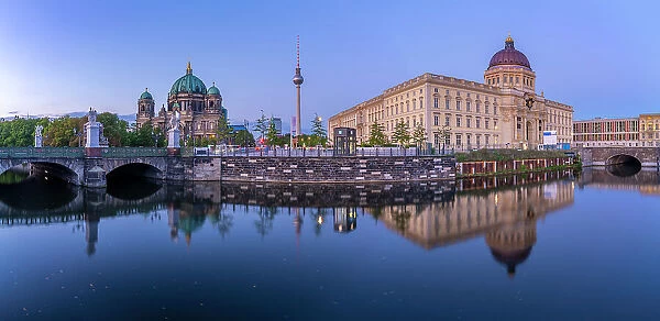 View of Berliner Dom, Berliner Fernsehturm and Humboldt Forum reflecting in River Spree at dusk, Berlin, Germany, Europe